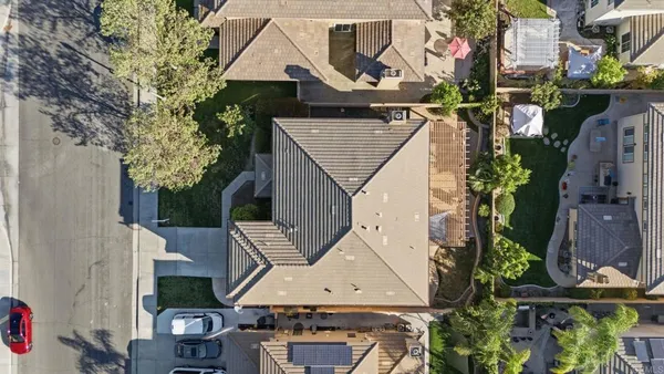 an aerial view of residential building with outdoor space