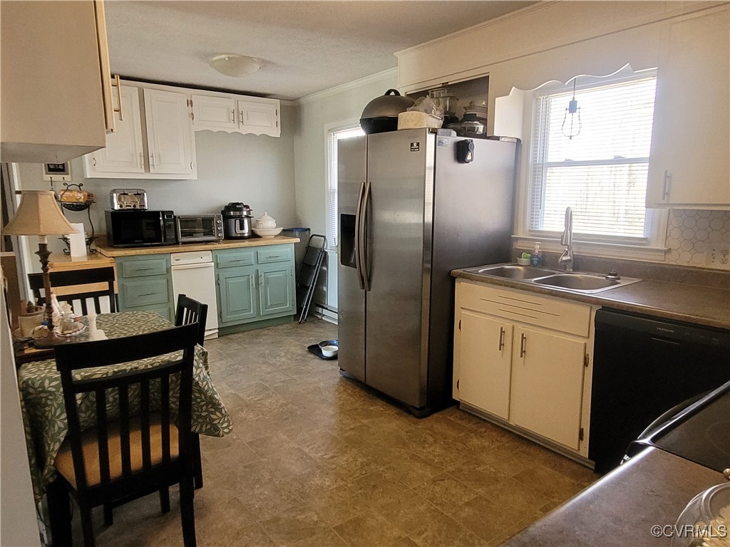 1685 Horseshoe Bend Road Keysville, VA 23947 - Photo 5 of 11 a kitchen with a sink appliances and cabinets