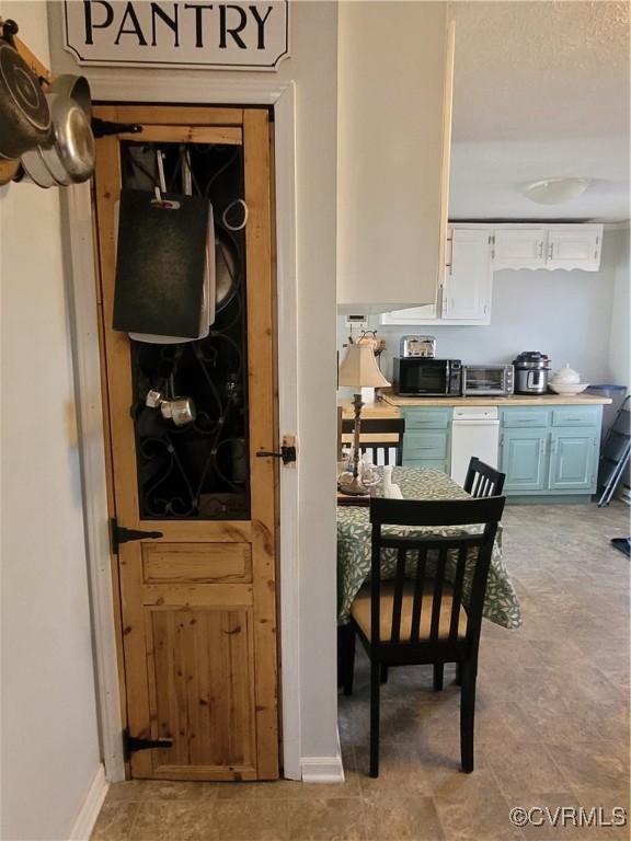 1685 Horseshoe Bend Road Keysville, VA 23947 - Photo 6 of 11 a kitchen with a wooden table and chairs