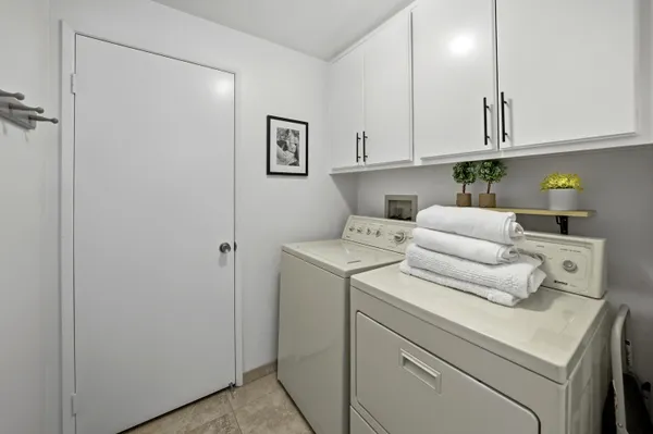 a bathroom with a granite countertop sink mirror and double