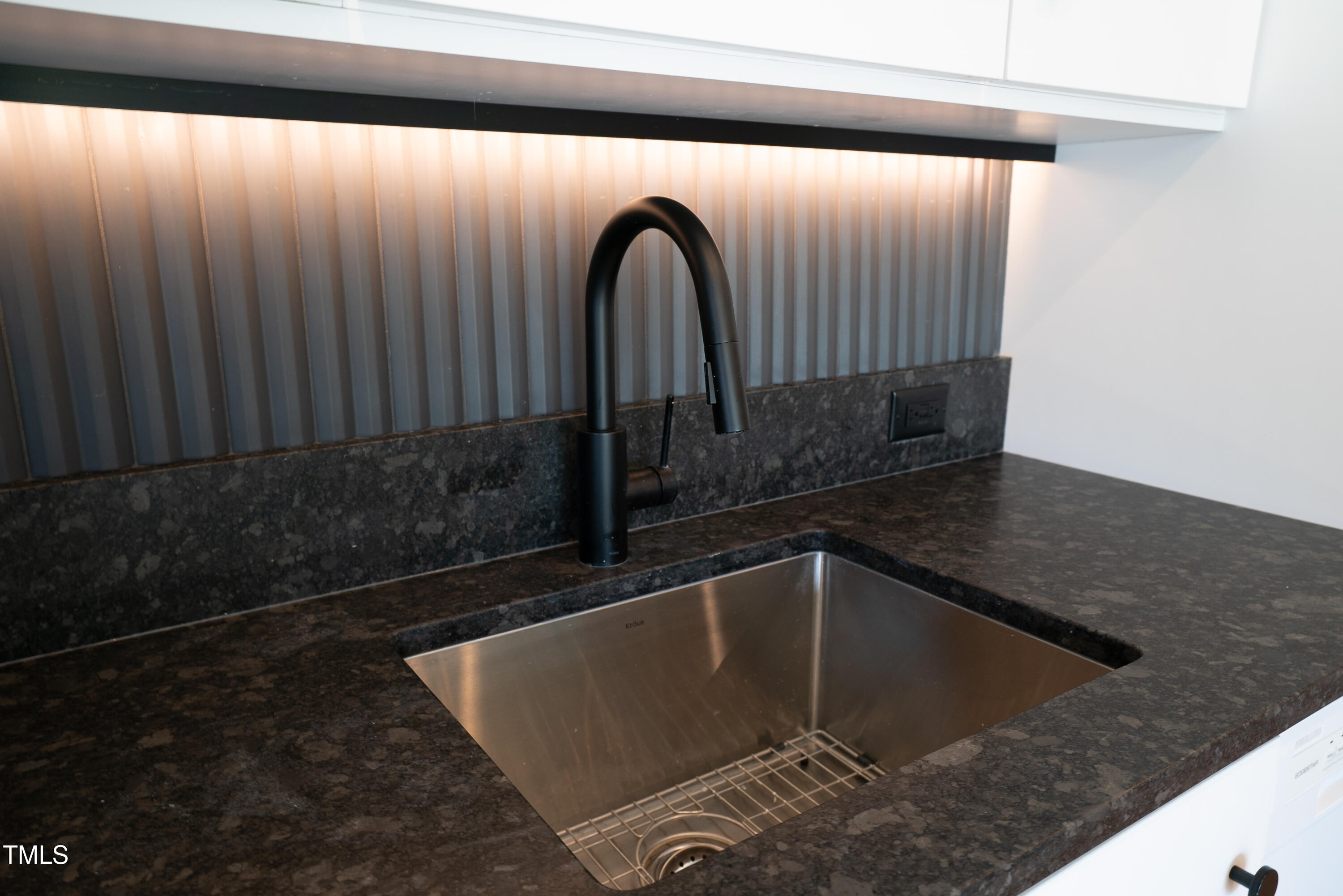 901 East Edenton Street, Unit 1 Raleigh, NC 27601 - Photo 2 of 17 a view of a sink with wooden floor