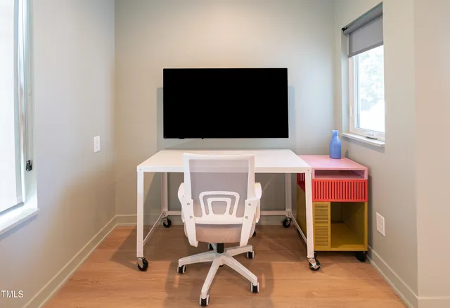 a view of a livingroom with furniture