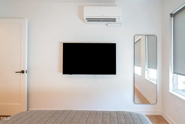 a view of a living room with a flat screen tv