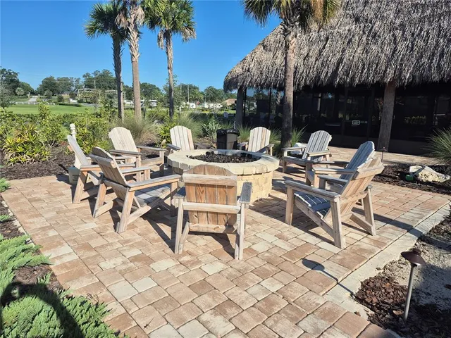 a view of a swimming pool with lounge chairs
