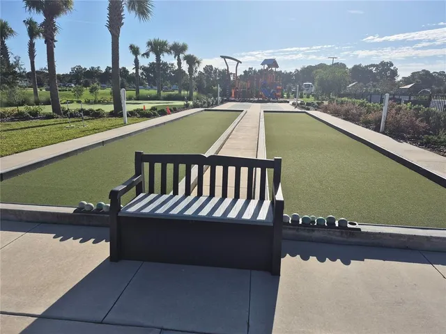 a view of a swimming pool with a lake view