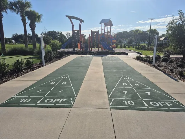 a view of a street with a building in the background
