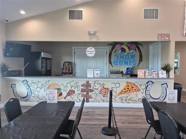a view of a dining room with furniture