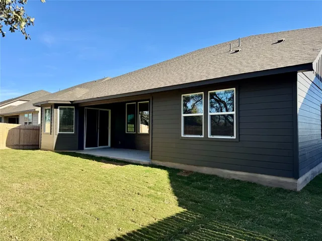 a house view with a garden space