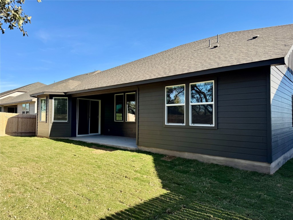 1764 South Main Street Kyle, TX 78640 - Photo 5 of 7 a house view with a garden space