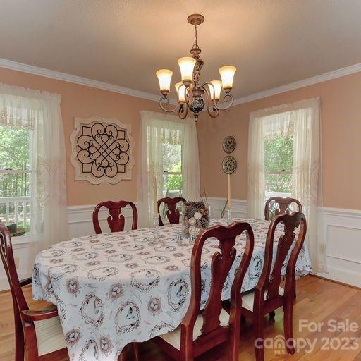 900 Woodland Forest Road Marvin, NC 28173 - Photo 14 of 36 a view of a dining room with furniture window and outside view