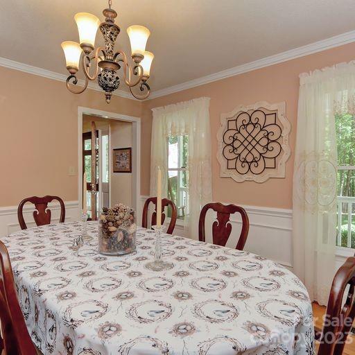 900 Woodland Forest Road Marvin, NC 28173 - Photo 15 of 36 a bedroom with a bed and a dresser with mirror