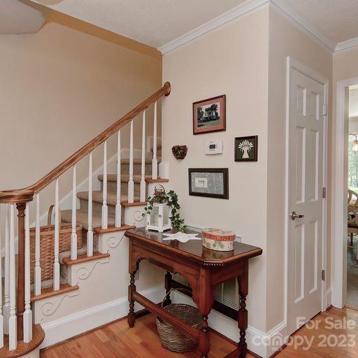 900 Woodland Forest Road Marvin, NC 28173 - Photo 3 of 36 a view of a workspace with furniture and wooden floor