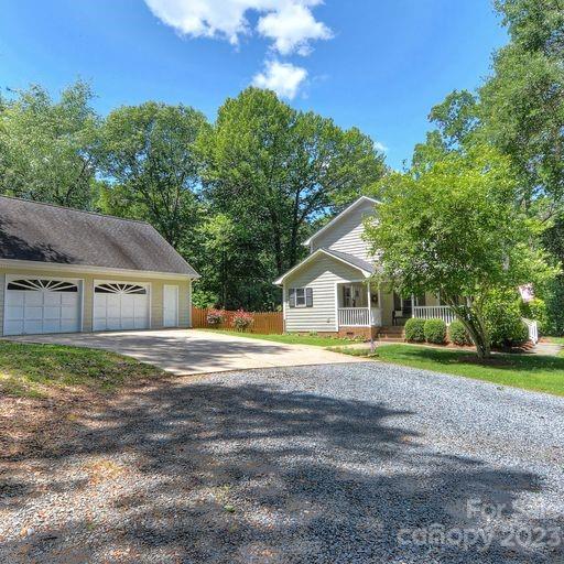 900 Woodland Forest Road Marvin, NC 28173 - Photo 34 of 36 a house that has a big yard and large trees
