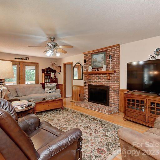 900 Woodland Forest Road Marvin, NC 28173 - Photo 4 of 36 a living room with furniture and a flat screen tv