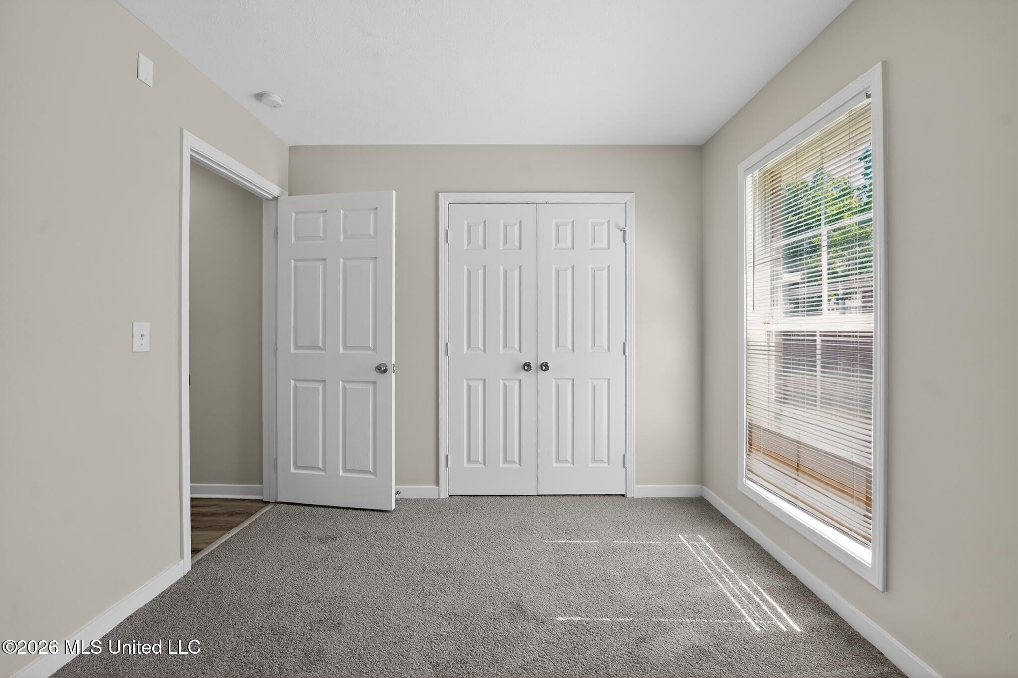 638 Oak Ridge Way Pearl, MS 39208 - Photo 14 of 20 13_638_Oak_Ridge_Wy-Bedroom-8160