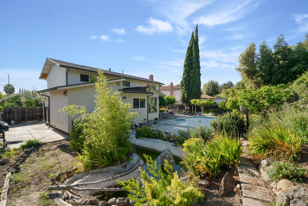 2240 Ruby Avenue San Jose, CA 95148 - Photo 11 of 18 a front view of a house with a yard