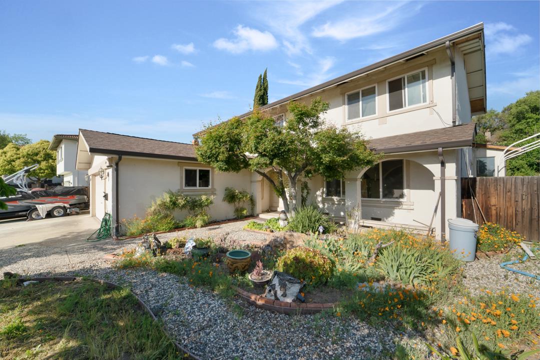 2240 Ruby Avenue San Jose, CA 95148 - Photo 2 of 18 a front view of a house with a yard
