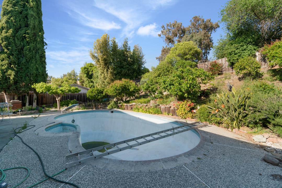 2240 Ruby Avenue San Jose, CA 95148 - Photo 7 of 18 a view of a swimming pool with a yard