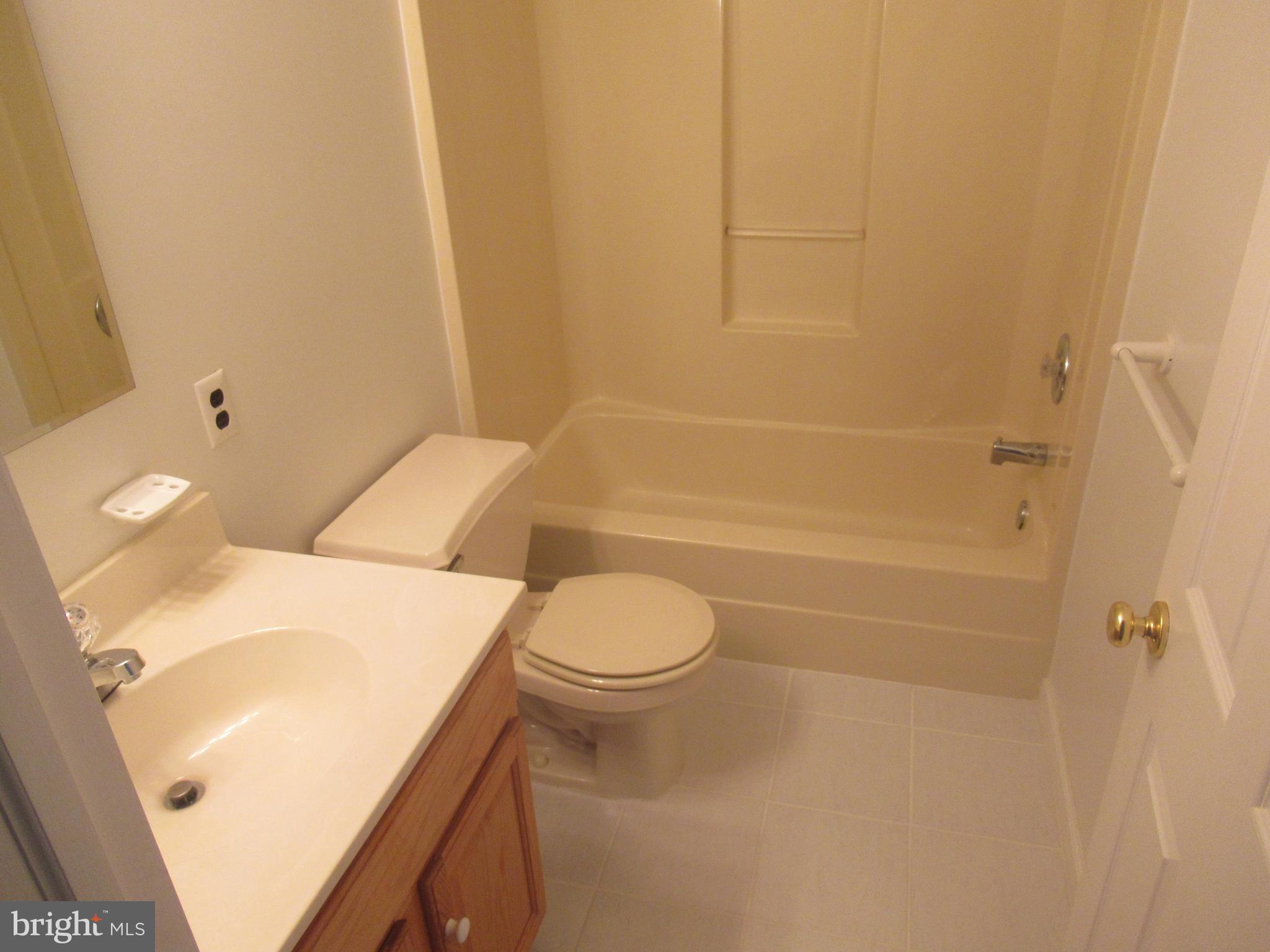 436 Coates Street Bridgeport, PA 19405 - Photo 11 of 20 a bathroom with a sink a toilet and shower