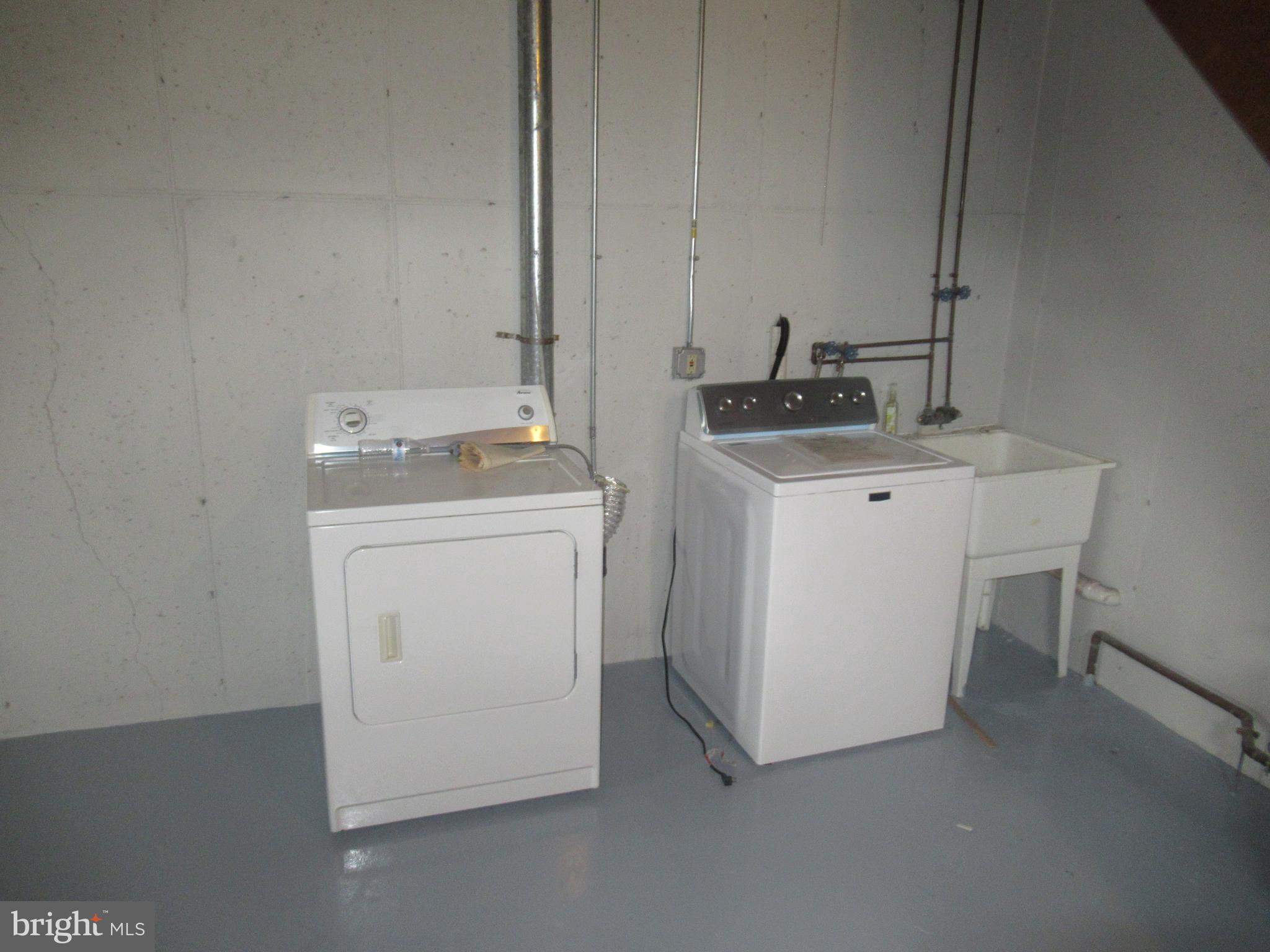 436 Coates Street Bridgeport, PA 19405 - Photo 16 of 20 a utility room with dryer and washer