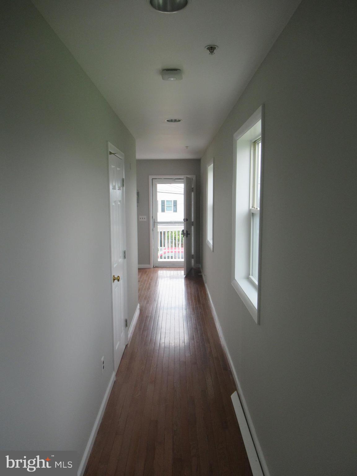 436 Coates Street Bridgeport, PA 19405 - Photo 20 of 20 a view of hallway with wooden floor