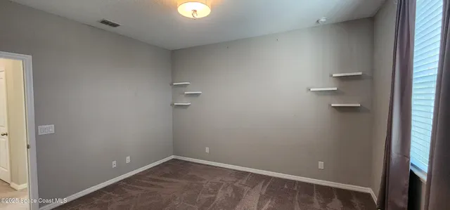 an empty room and a window