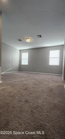 an empty room with an entryway
