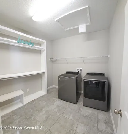 a kitchen with a stove and a microwave