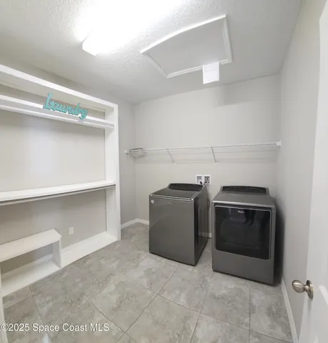 a kitchen with a stove and a microwave