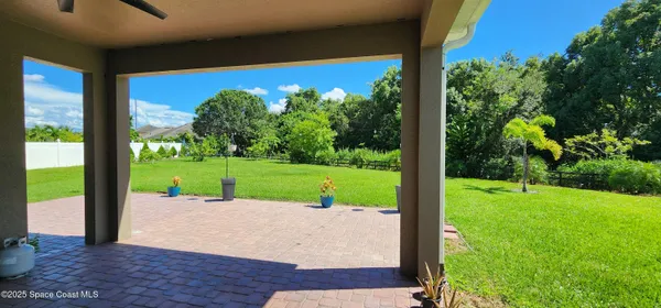 a view of a road with a big yard