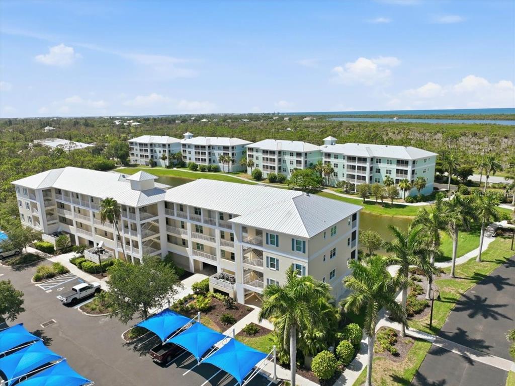 8411 Placida Road, Unit 407 Placida, FL 33946 - Photo 38 of 43 a view of a city with tall buildings
