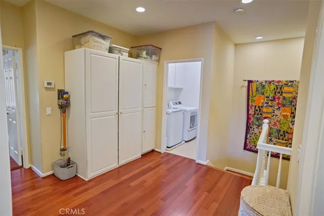 a view of bathroom with tub and shower