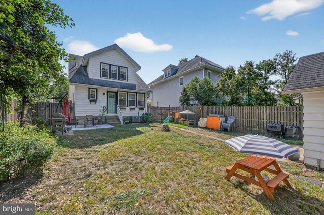 a backyard of a house with seating space