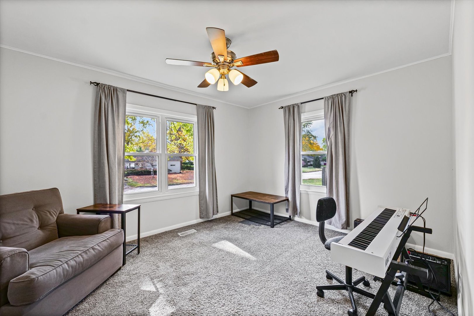 1608 Sheridan Road Champaign, IL 61821 - Photo 19 of 29 a living room with furniture and a window