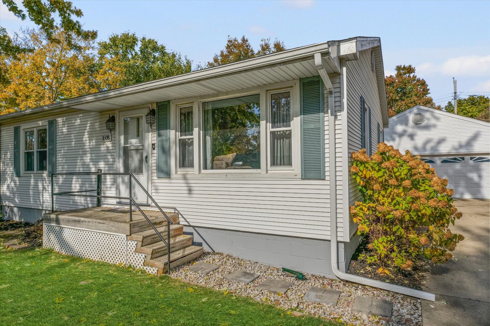 1608 Sheridan Road Champaign, IL 61821 - Photo 5 of 29 a view of a house with a iron fence
