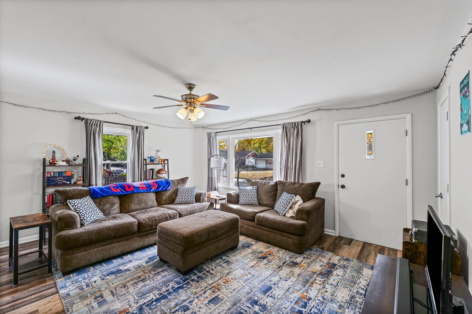 1608 Sheridan Road Champaign, IL 61821 - Photo 8 of 29 a living room with furniture and a flat screen tv