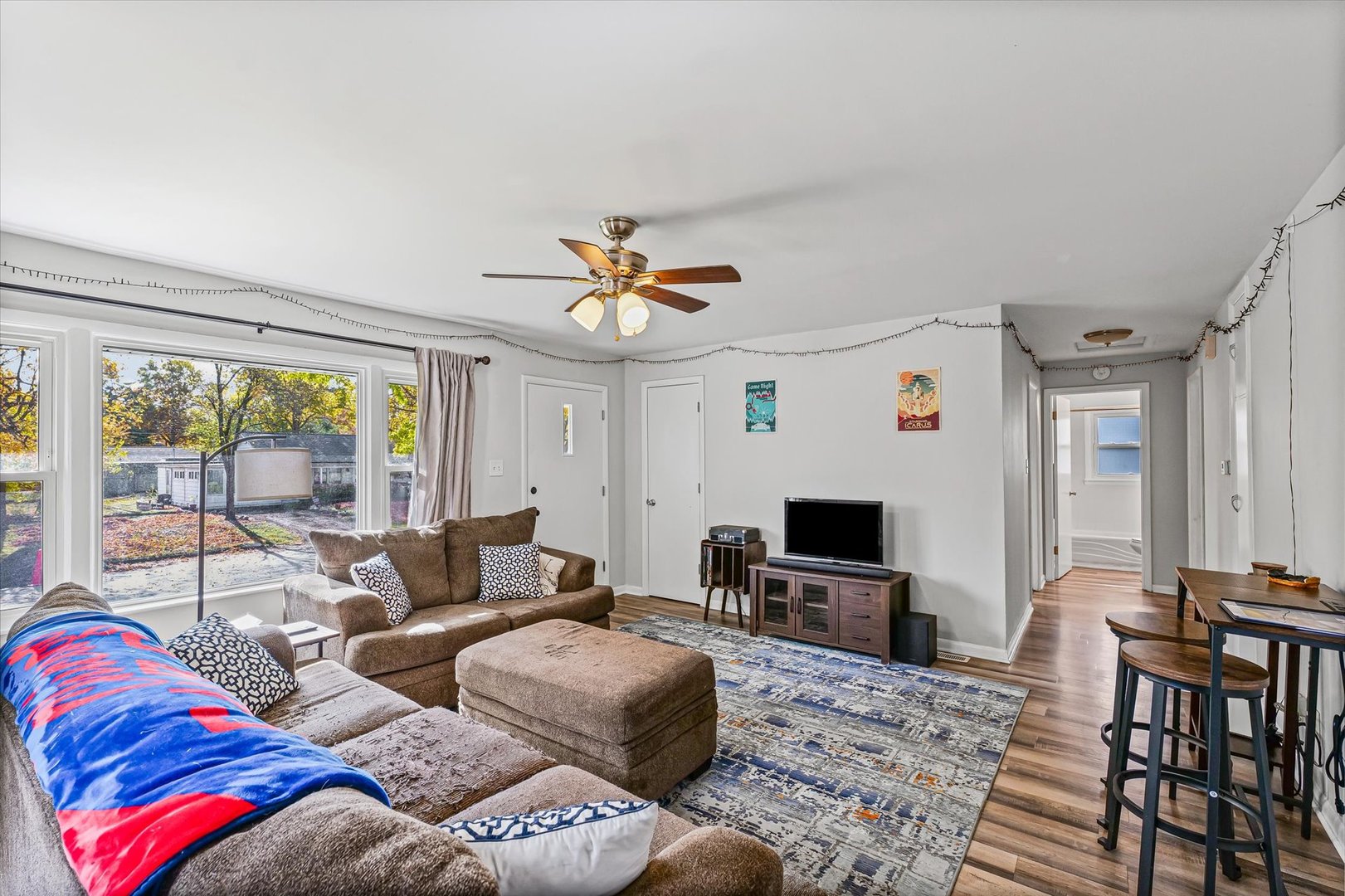 1608 Sheridan Road Champaign, IL 61821 - Photo 9 of 29 a living room with furniture and a flat screen tv