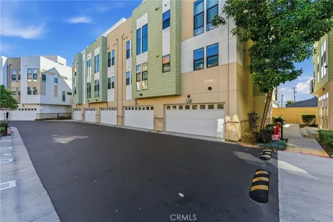 a view of a building with a street