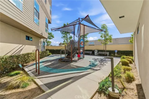 a view of a chairs and table in the patio