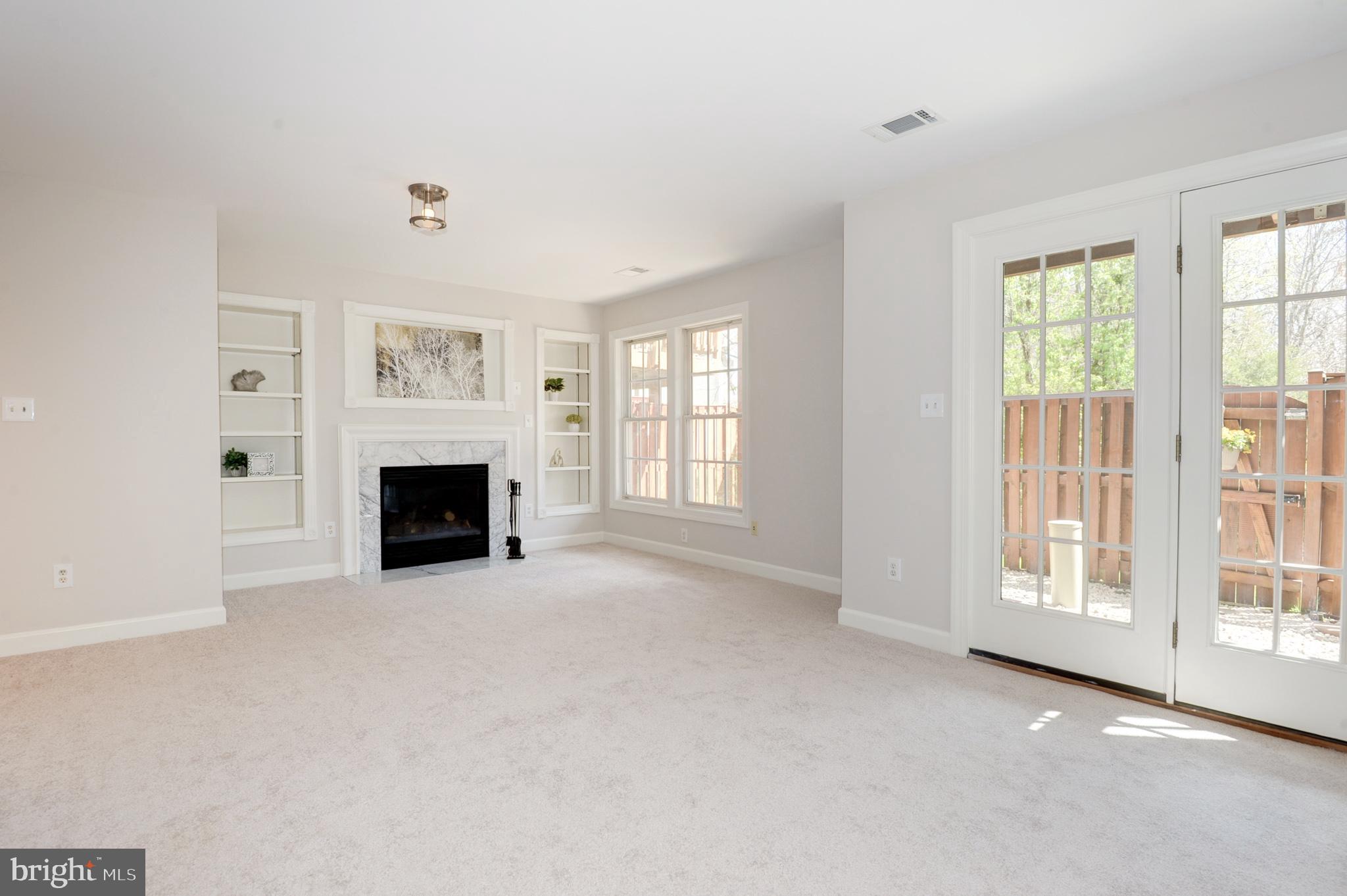 6489 Topsails Lane Springfield, VA 22150 - Photo 23 of 28 Lower-Level Large Rec Room w Gas Fireplace