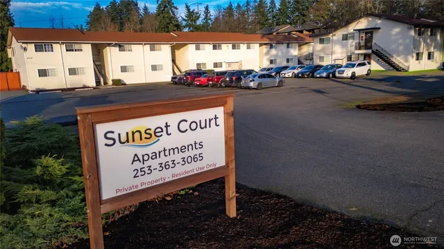 a view of a street with cars