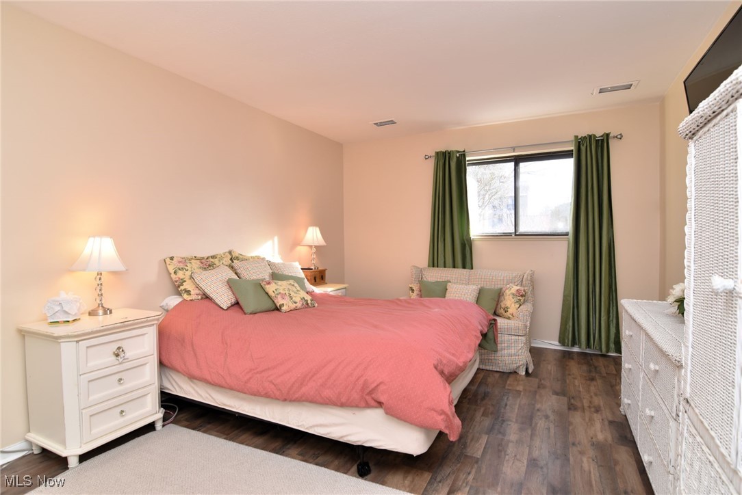 1105 Canyon View Road, Unit 602 Northfield, OH 44067 - Photo 20 of 31 Bedroom with dark hardwood / wood-style flooring