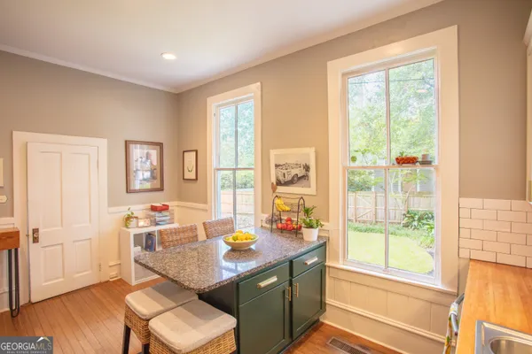 a view of a hallway with a chandelier