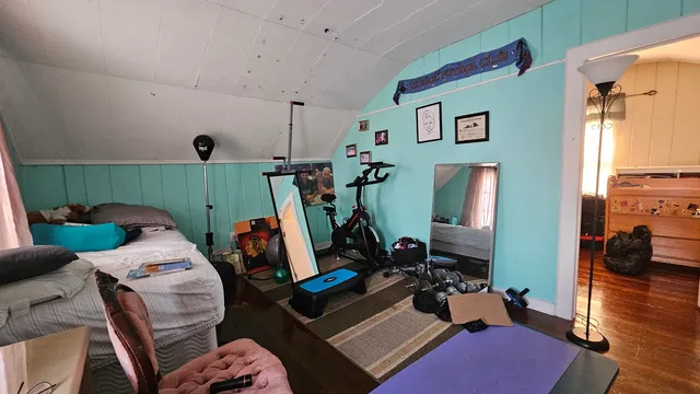 a view of a room with gym equipment