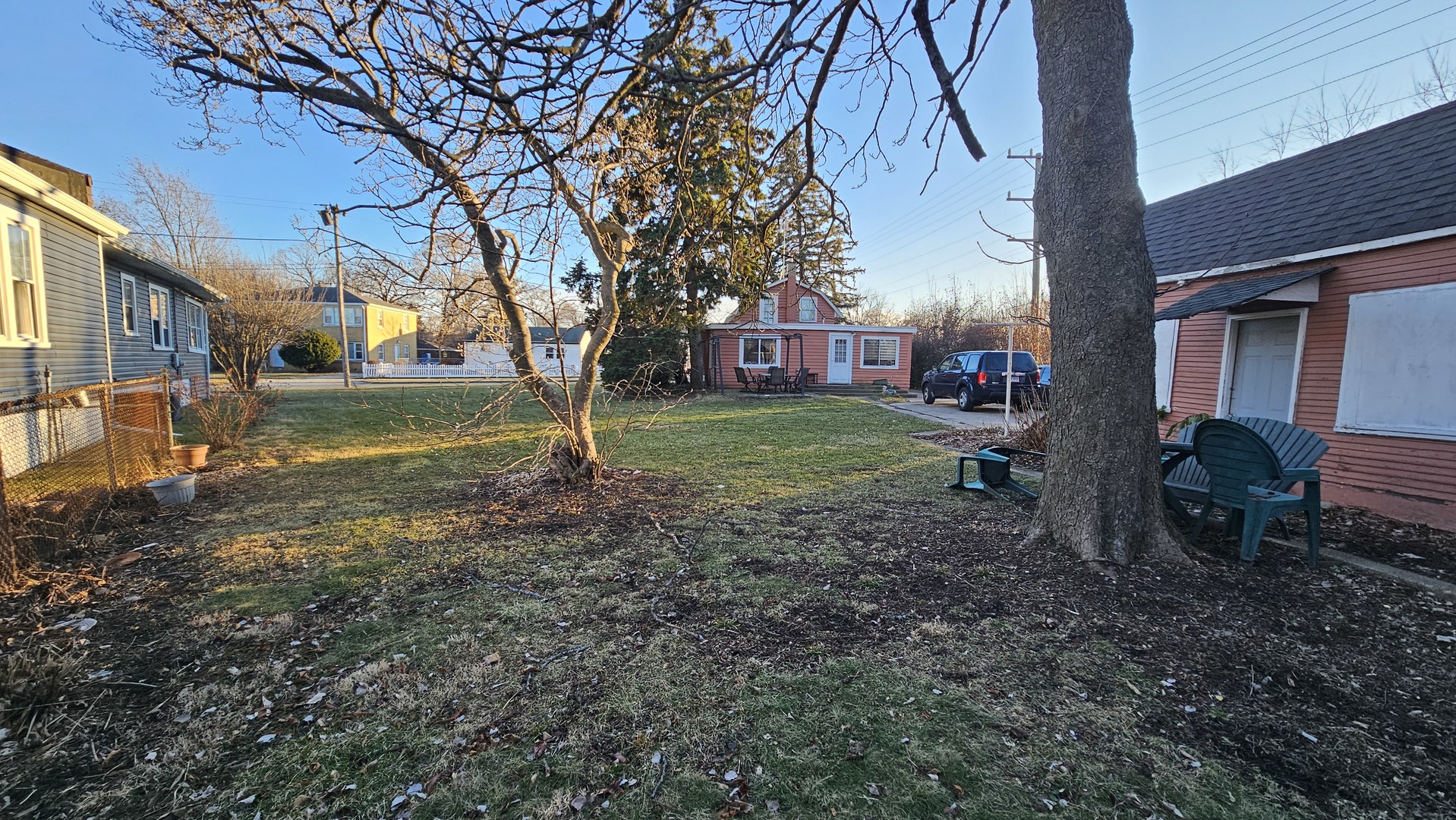 1124 Jackson Court Waukegan, IL 60085 - Photo 2 of 17 a view of a backyard with large trees