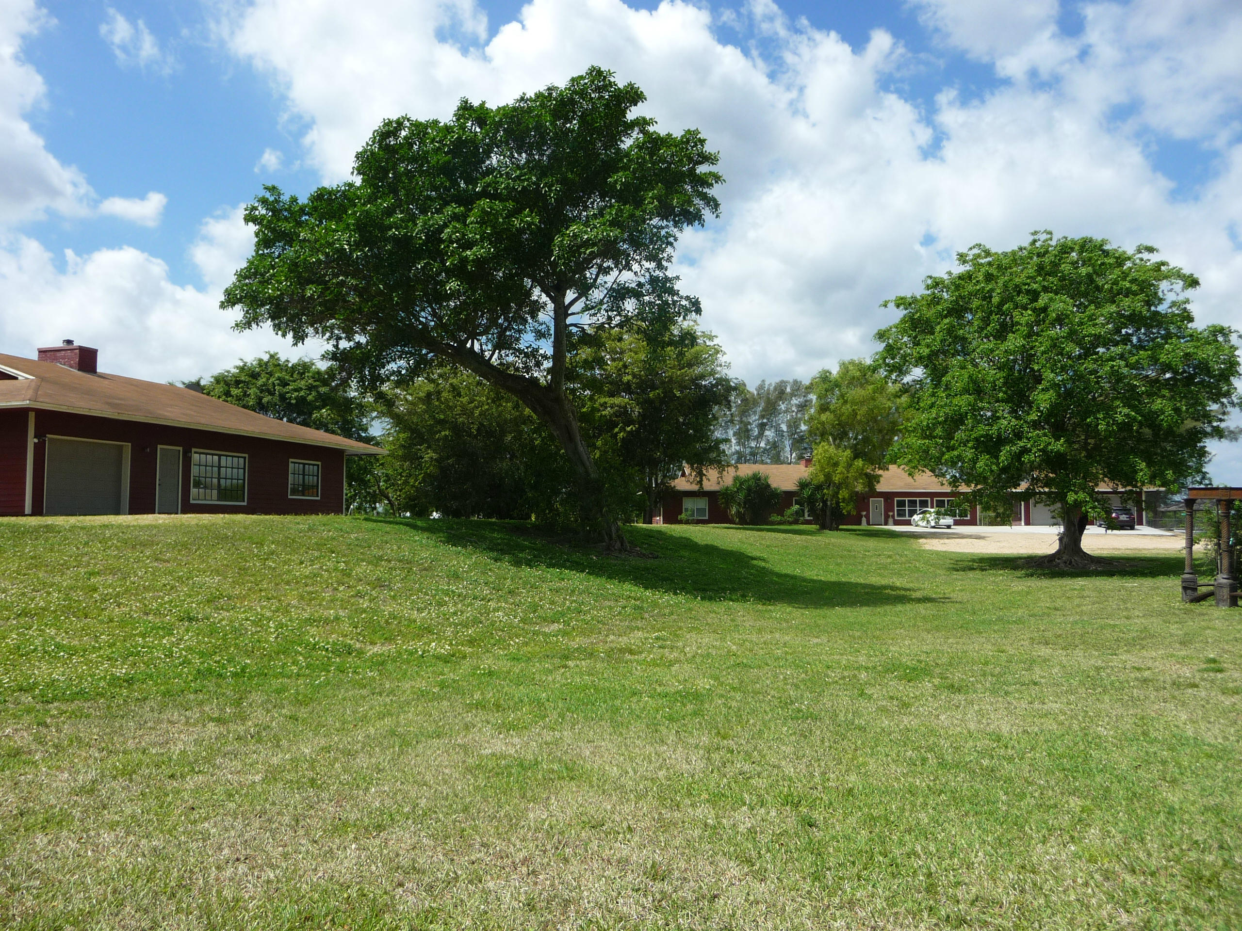 19655 118th Trail South, Unit FRNT Boca Raton, FL 33498 - Photo 31 of 31 a view of a house with a big yard