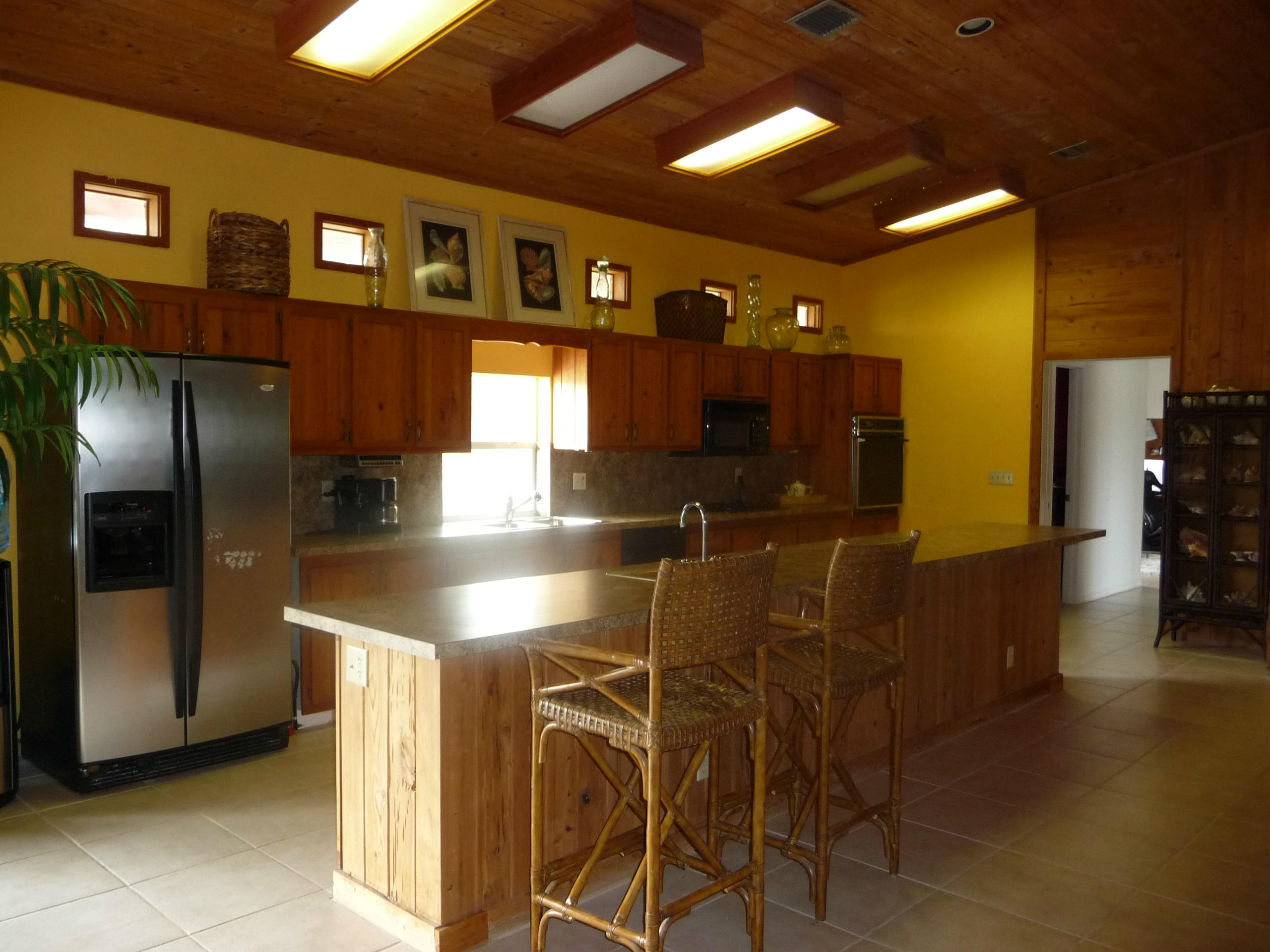 19655 118th Trail South, Unit FRNT Boca Raton, FL 33498 - Photo 6 of 31 a view of a dining room with furniture