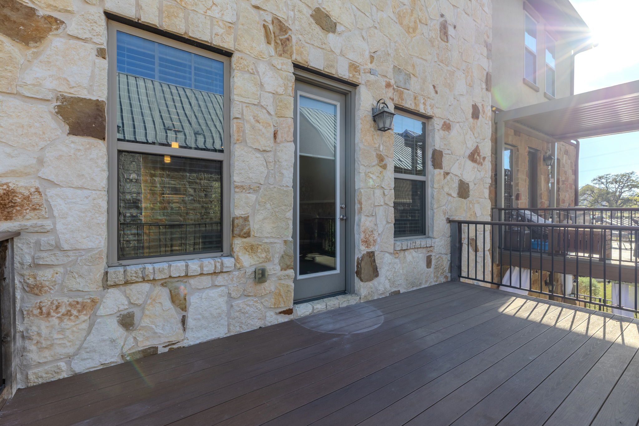 1125 Highknoll Lane Georgetown, TX 78628 - Photo 34 of 40 a view of a brick house with large windows