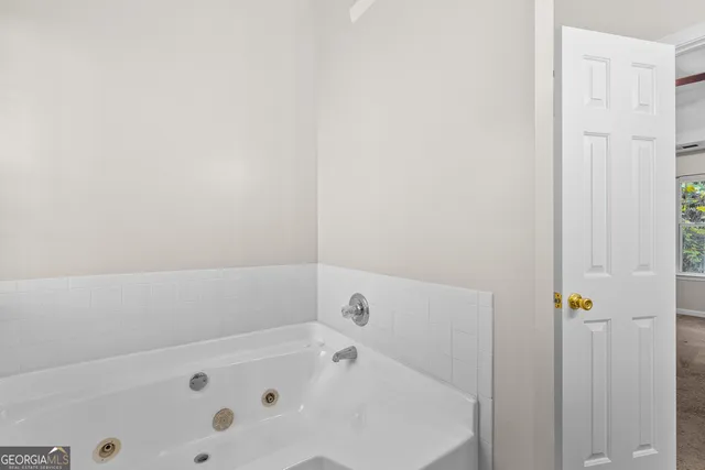 a bathroom with a bathtub