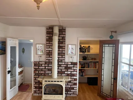 a view of livingroom with furniture and windows